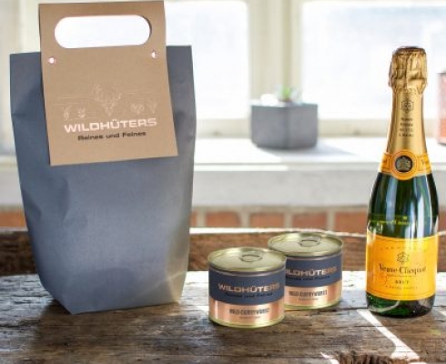 Wildhüters Präsentetüte Champanger Veuve Clicquot 0,375 l & Wildcurrywurst